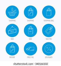 Shopping cart, gift bag and sale coupon icons. Special offer label linear signs. Discount icon. Blue circle buttons set. Linear icons.