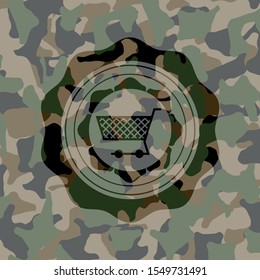 shopping cart icon inside camouflage emblem