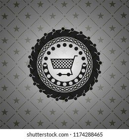 shopping cart icon inside dark emblem
