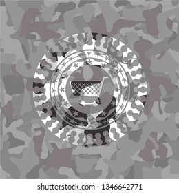 shopping cart icon inside grey camo emblem
