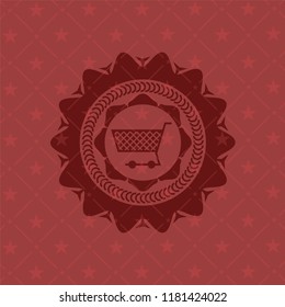 shopping cart icon inside red emblem