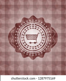shopping cart icon inside red emblem with geometric pattern. Seamless.