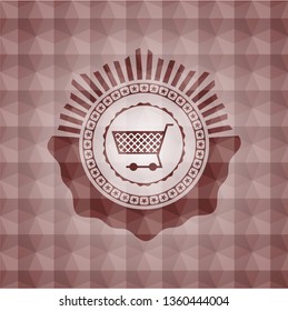 shopping cart icon inside red seamless geometric badge.