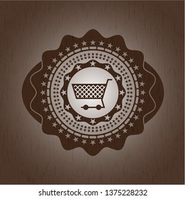 shopping cart icon inside retro style wood emblem