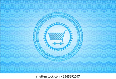 shopping cart icon inside sky blue water emblem background.