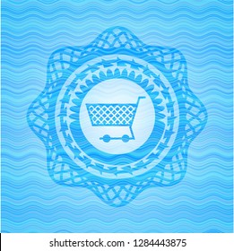 shopping cart icon inside water representation emblem.