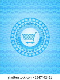 shopping cart icon inside water wave representation emblem background.