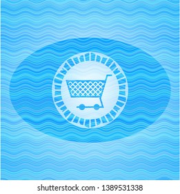 shopping cart icon inside water wave representation emblem background.