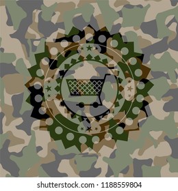 shopping cart icon on camouflaged texture