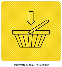 Shopping cart icon. Online buying sign. Linear icon on orange background. Vector