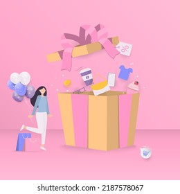 Shopping concept. Happy woman holding balloons with a shopping bag and products out of the gift box.
