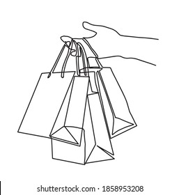 Concepto de compras. Dibujo de una línea de vector aislado de la bolsa de la mano de una niña. Compras de vacaciones. Un dibujo continuo de la línea de la mano femenina que sostiene bolsas de compras aisladas en fondo blanco. 