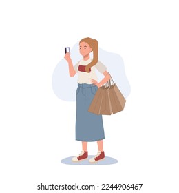 Shopping concept. woman holding a credit card and shopping bags in her hands. Flat cartoon vector illustration