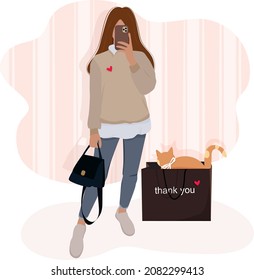 Shopping girl and happy cat