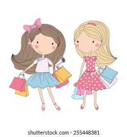 Shopping girls. Cute girls with shopping bags