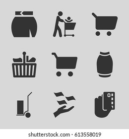 Shopping icons set. set of 9 shopping filled icons such as money on hand, skirt, cart cargo