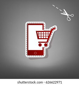 Shopping on smart phone sign. Vector. Red icon with for applique from paper with shadow on gray background with scissors.
