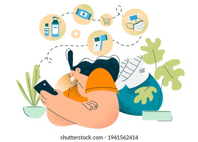 Shopping online during COVID-19 pandemic concept. Young woman sitting at home and ordering and buying food, medicine and household online on smartphone during pandemic times 