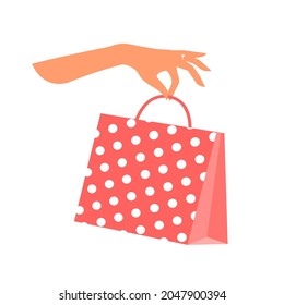 Shopping red bag on a white background. Female hand holds package. Shopping, sale and discount concept. Vector isolated flat illustration