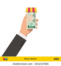 Shopping in the store. Hand giving Dirham banknote vector illustration.