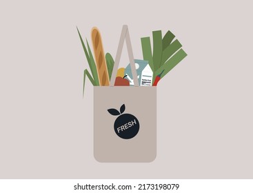 A shopping tote bag filled with farmers market groceries