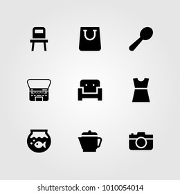 Shopping vector icon set. photo camera, dress, kettle and chair