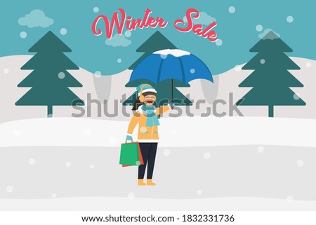 Shopping in winter sale vector concept: Young woman carrying shopping bag while holding an umbrella with word of winter sale