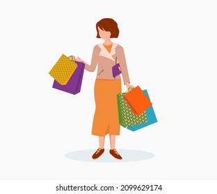 Shopping. Woman with paper bags in her hands.