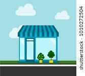 Shops and stores icon in flat design vector with sky and clouds.