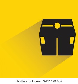 short pant icon with shadow on yellow background