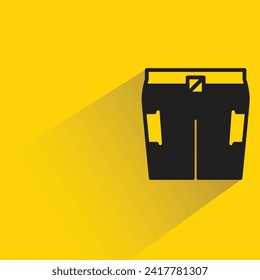 short pant icon with shadow on yellow background