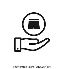 Short pants on hand. Clothing, fashion, apparel icon line style isolated. Vector illustration