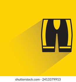short pants with shadow on yellow background
