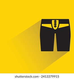 short pants with shadow on yellow background
