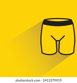 short pants with shadow on yellow background