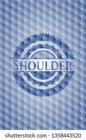 Shoulder blue badge with geometric background.