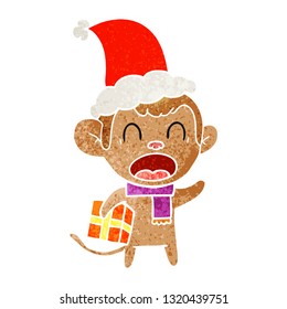 caricatura retro dibujada a mano de un mono cargando regalo de navidad usando sombrero santa