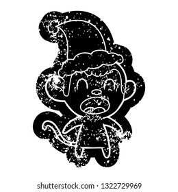 shouting quirky cartoon distressed icon of a monkey wearing santa hat