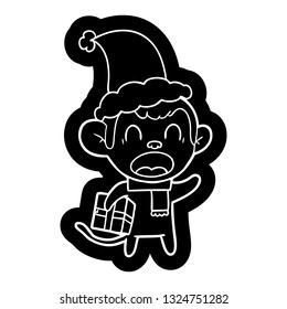 schrie unscharfe Cartoon-Ikone eines Affen mit Weihnachtsgeschenk mit Weihnachtsmütze