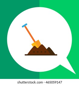 Shovel in heap of soil