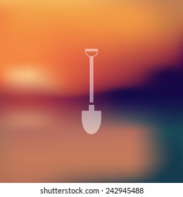 shovel icon on blurred background
