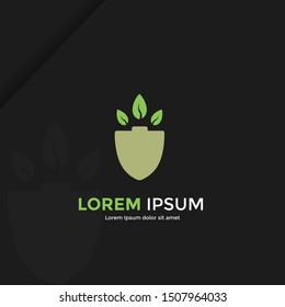 Shovel and  leaves logo template. gardening plant. garden tool vector design. Eps10