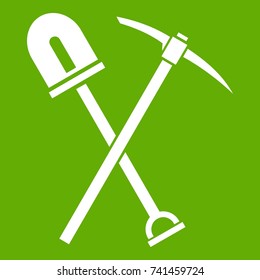 Shovel and pickaxe icon white isolated on green background. Vector illustration