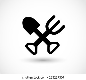Shovel and pitchfork crossed icon vector