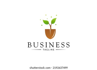 shovel with plants for agriculture and gardening logo