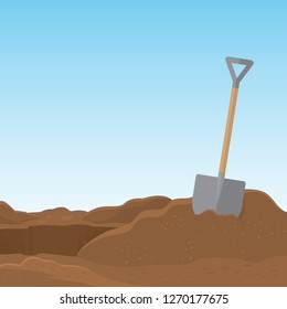 Shovel stuck in the soil isolated