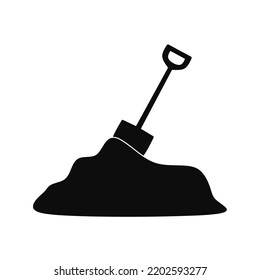 shovel vector in a pile of sand