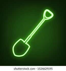 Shovel to work in the garden. Green neon icon in the dark. Blurred lightening. Illustration.