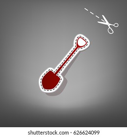 Shovel to work in the garden. Vector. Red icon with for applique from paper with shadow on gray background with scissors.