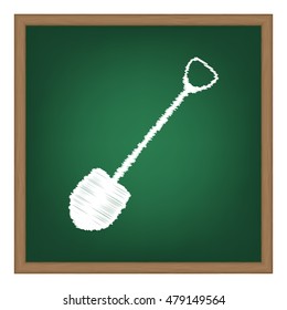 Shovel to work in the garden. White chalk effect on green school board.